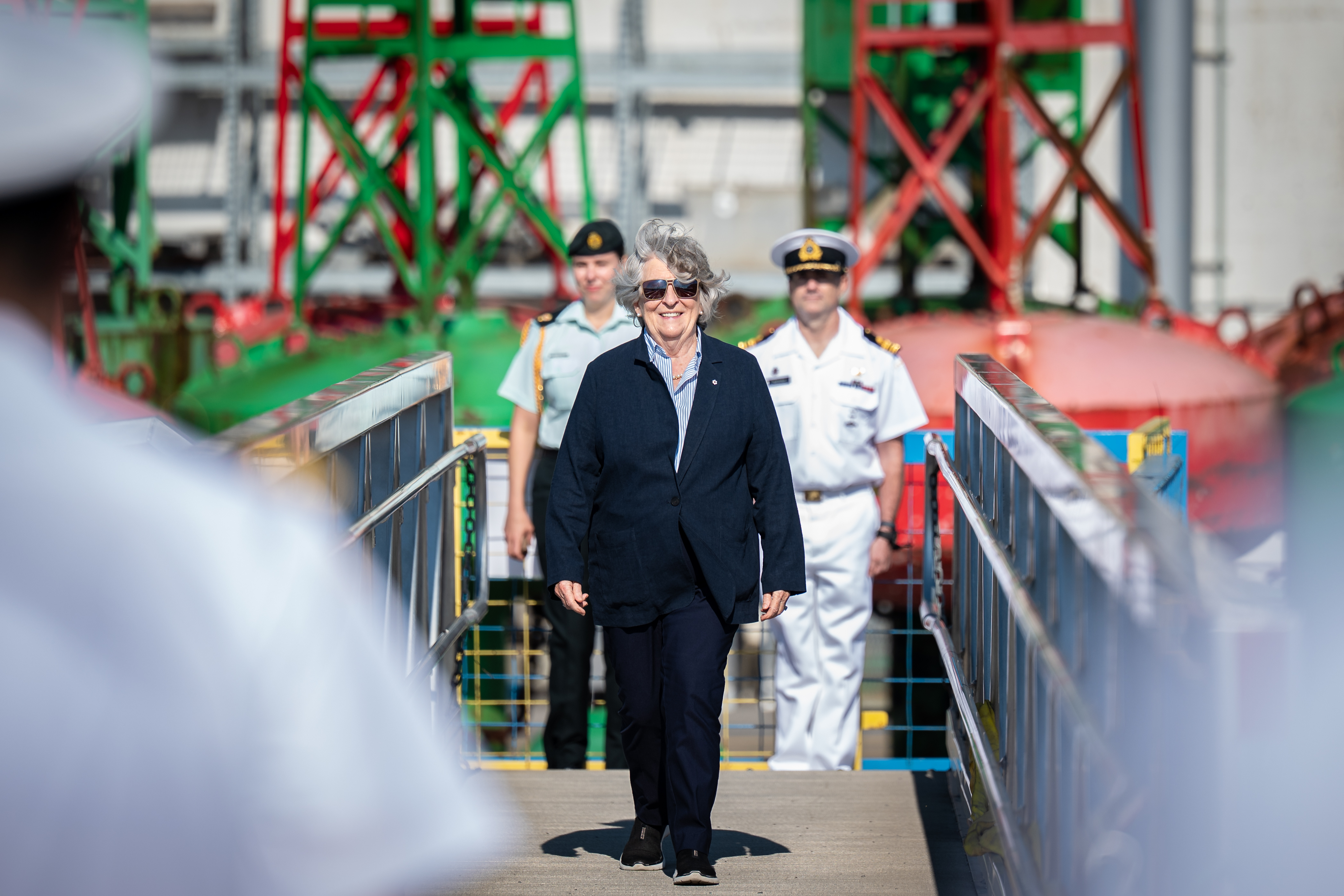 Governor General Arbour walking onto a ship.