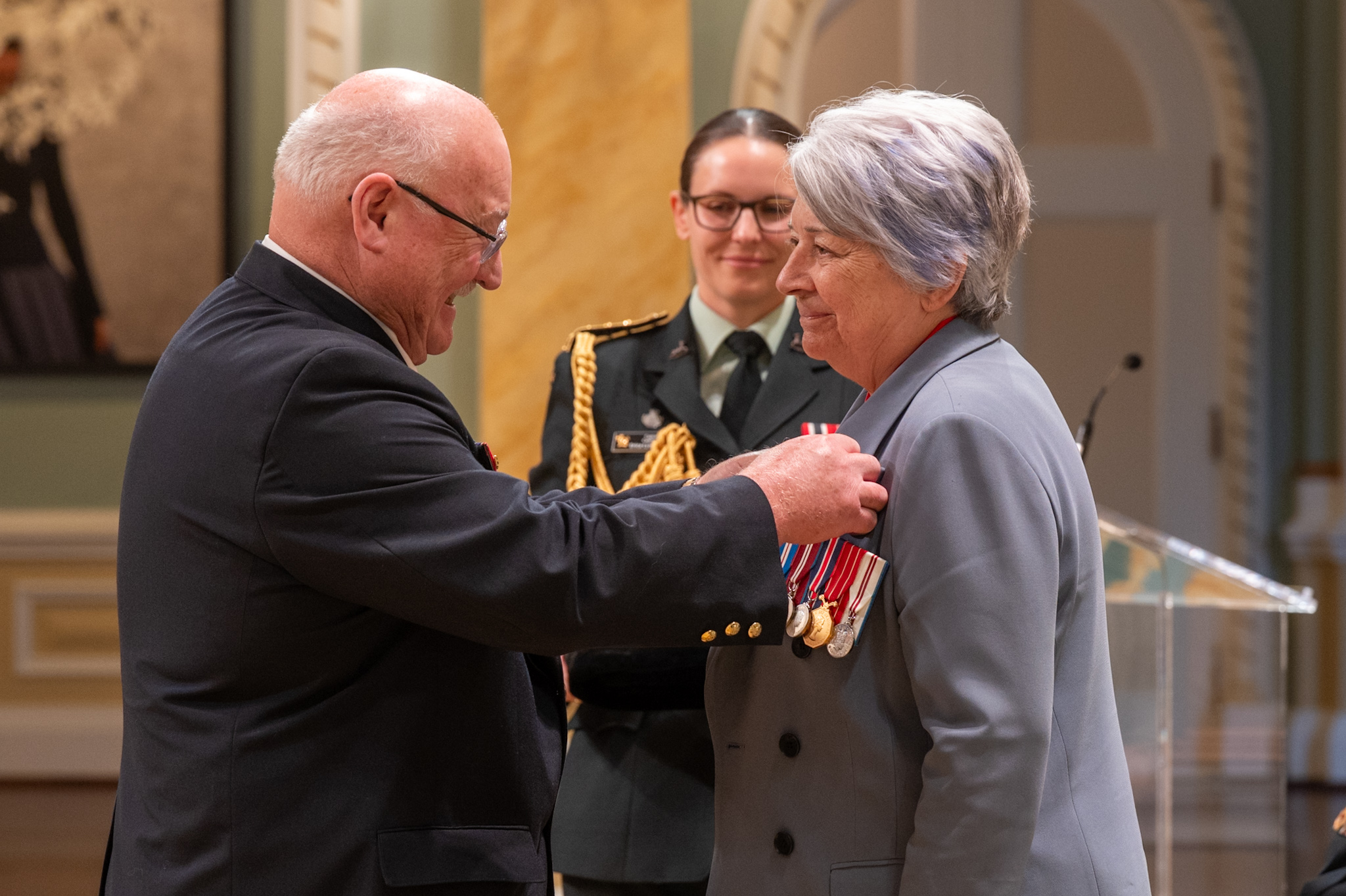 Governor General Mary Simon receiving the first poppy of 2025