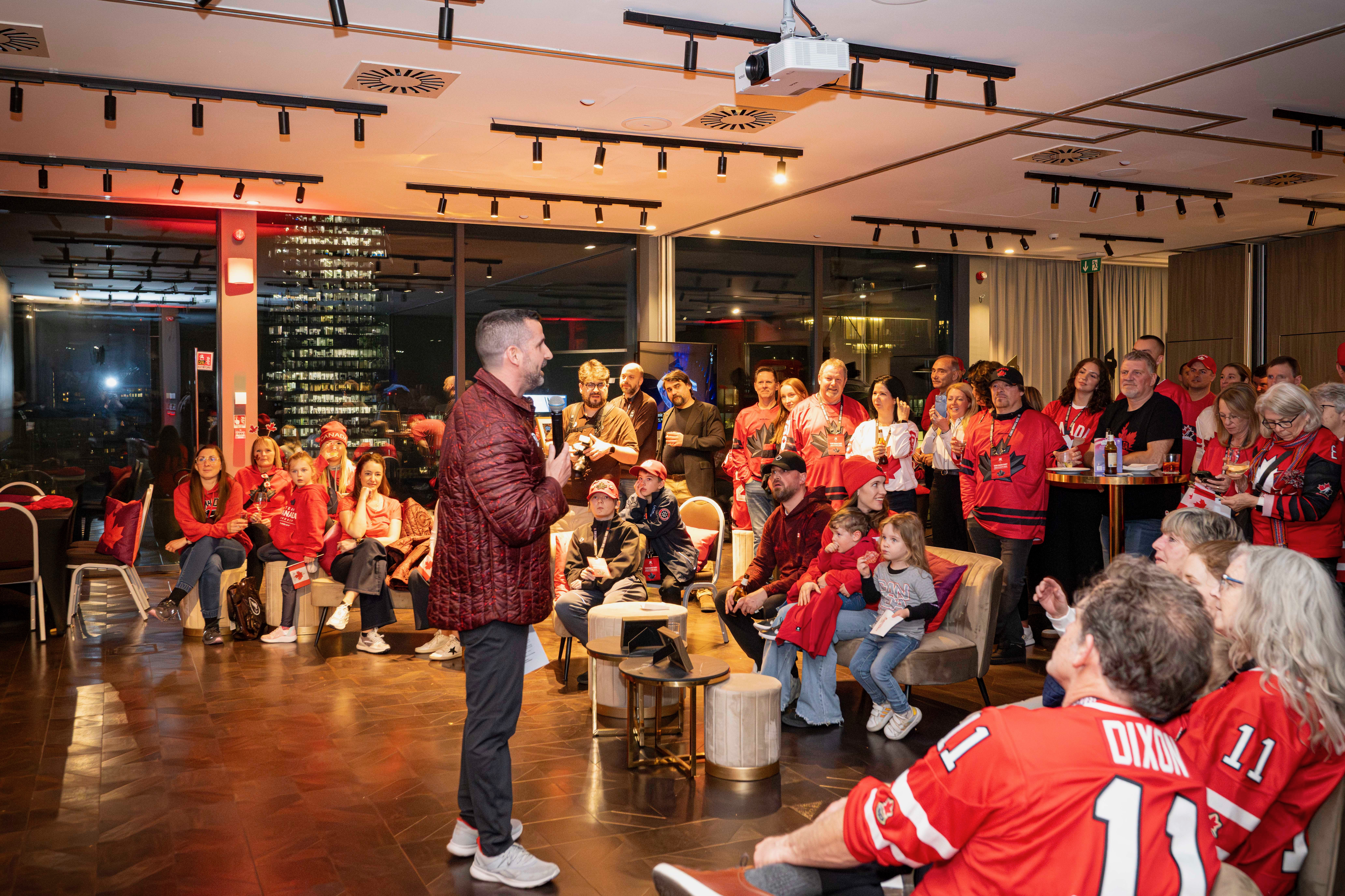 Families and close friends of Canada’s Paralympic athletes watching the opening ceremony on television..