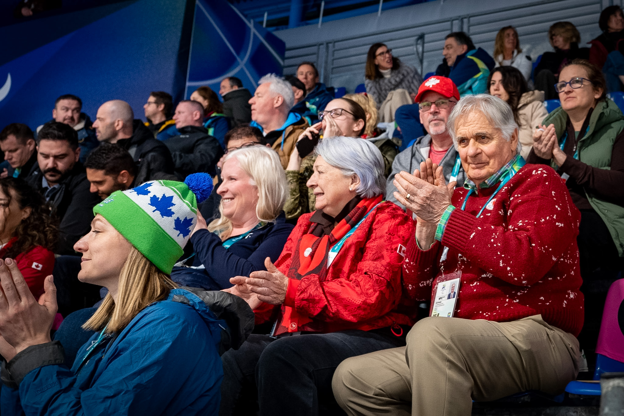 Governor General Mary Simon and Mr. Whit Fraser in the stands cheering on Canadian Paralympic athletes.