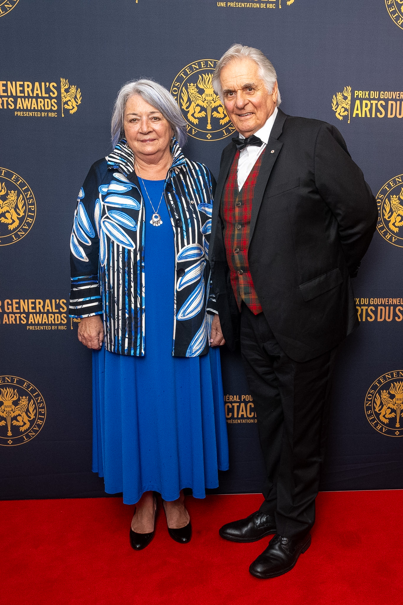 Governor General Mary Simon and Mr. Whit Fraser on the red carpet at the National Arts Centre for the Governor General Performing Arts Awards.