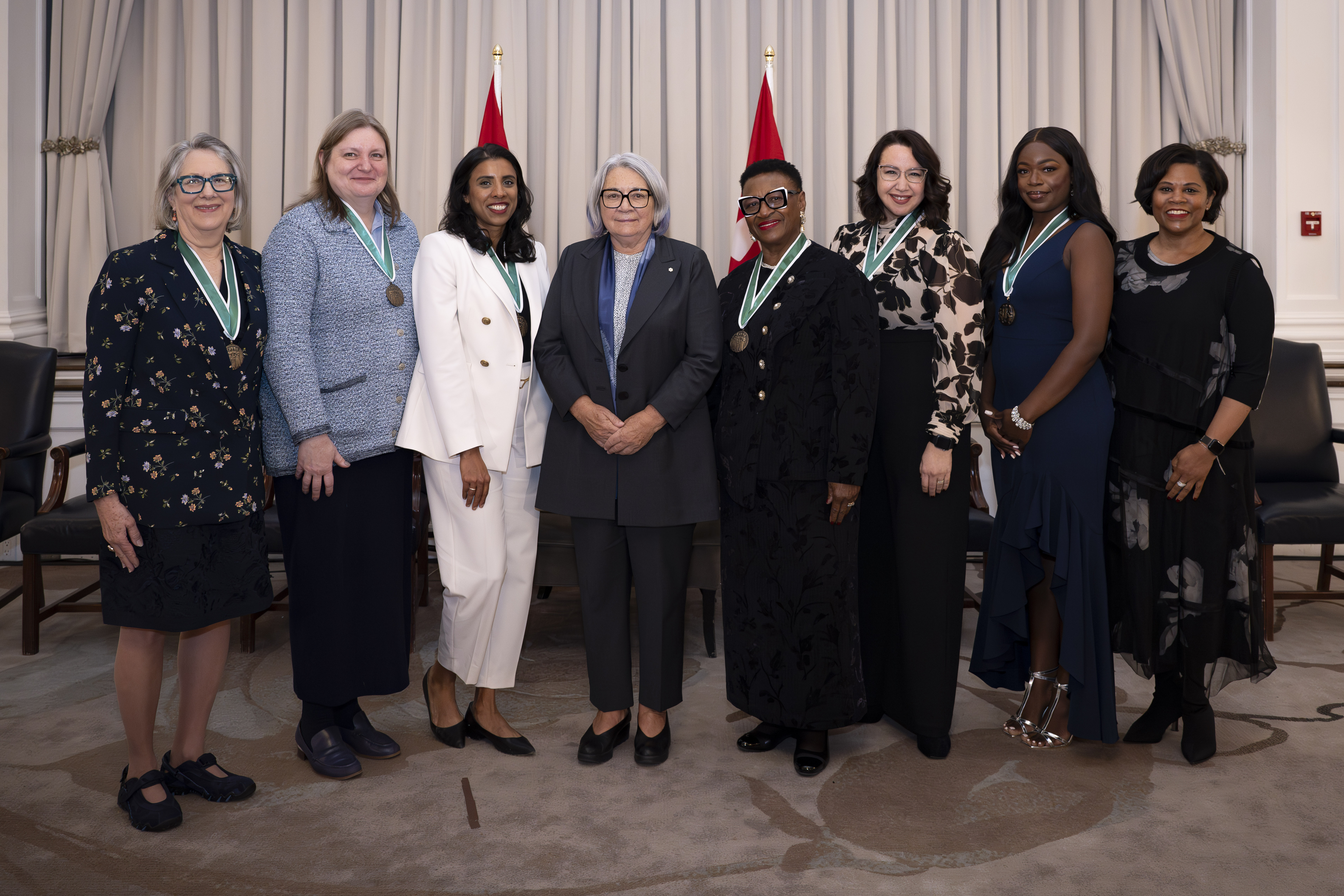 Governor General Mary Simon posing with award recipients.