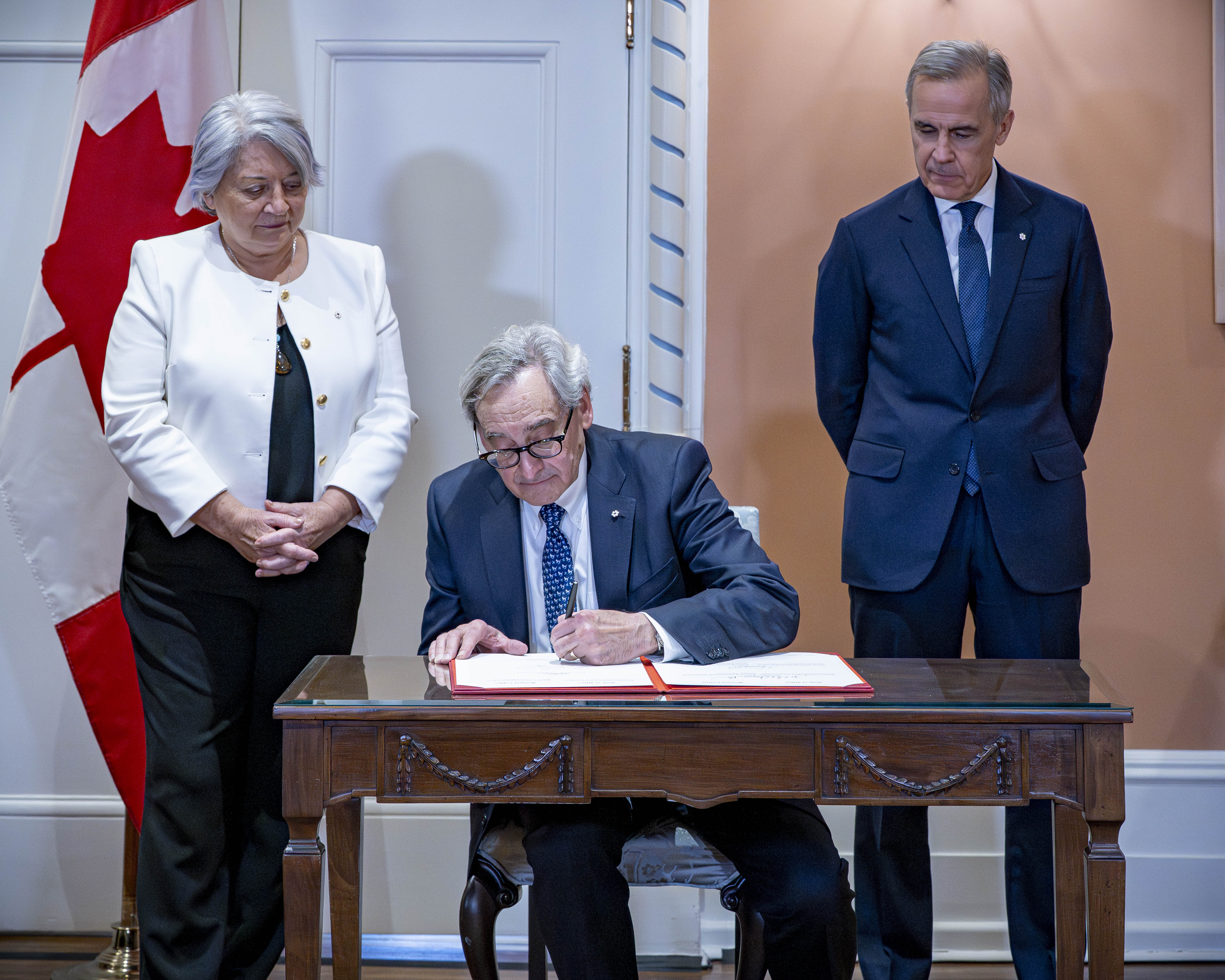 Left to right: Governor General Mary Simon, Clerk of the Privy Council and Prime Minister Mark Carney.