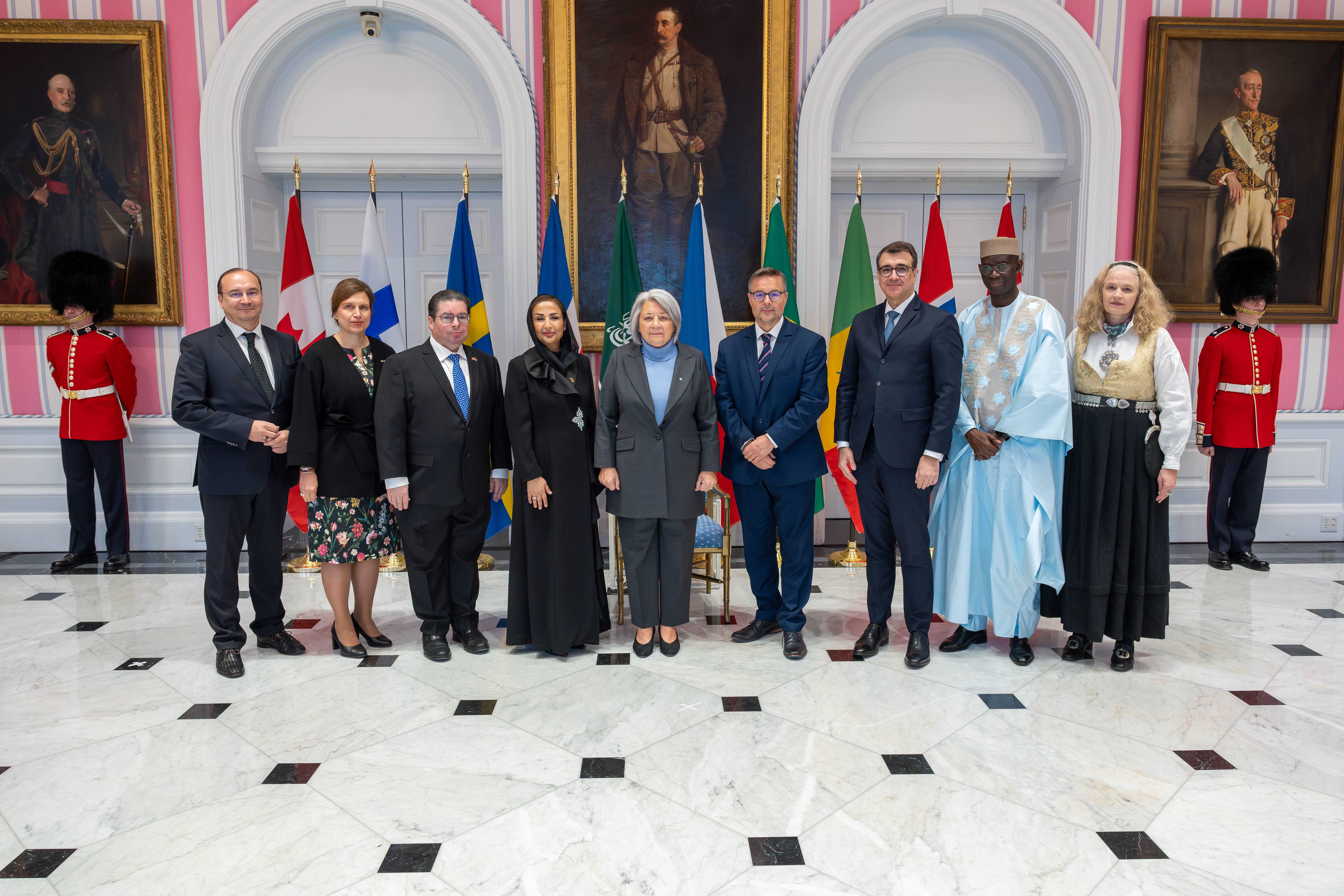 Governor General Mary Simon stands with the new Heads of Mission