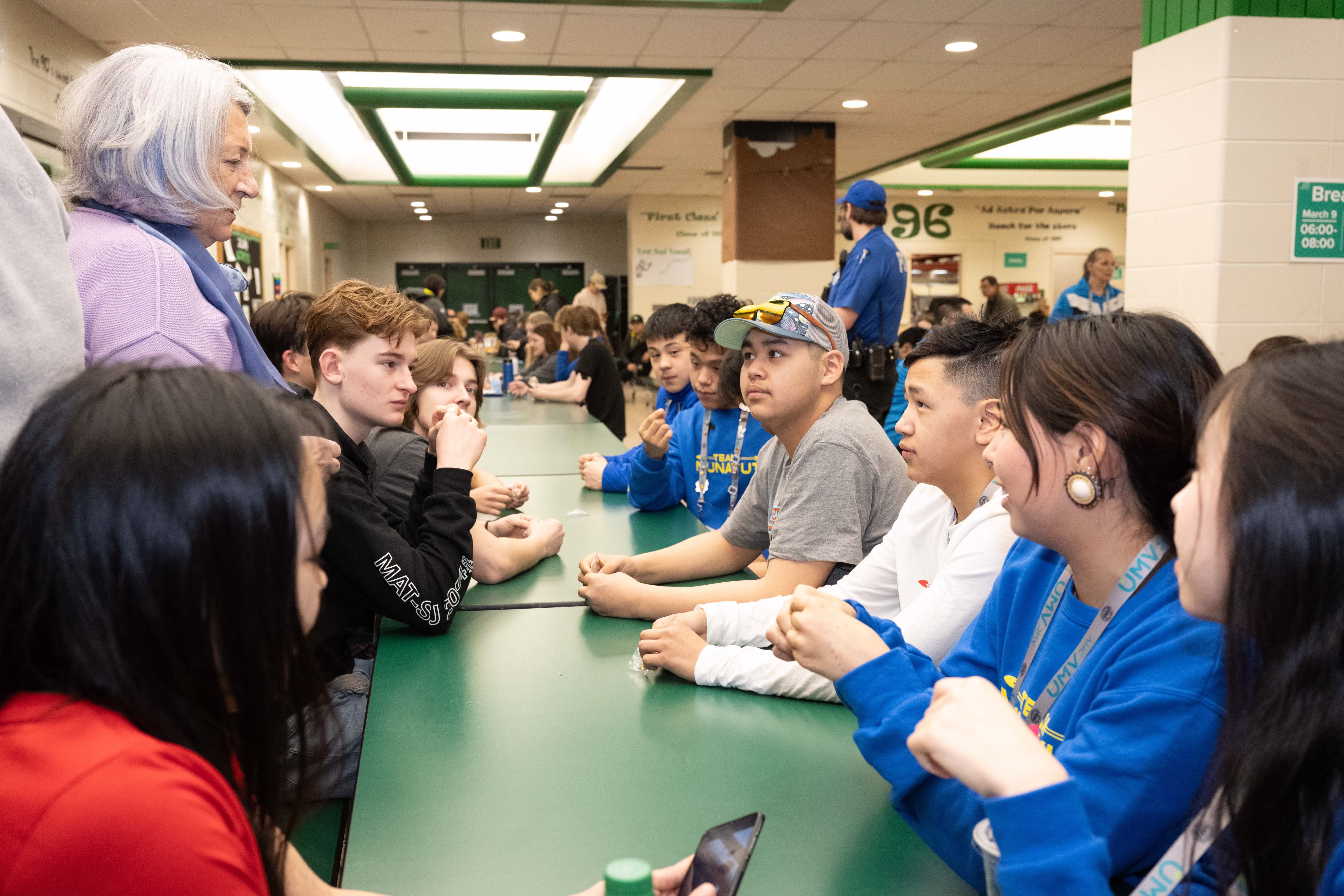 Governor General Mary Simon speaks with athletes