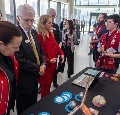 The Governor General meets with students from Simon Fraser University and hears about their projects.