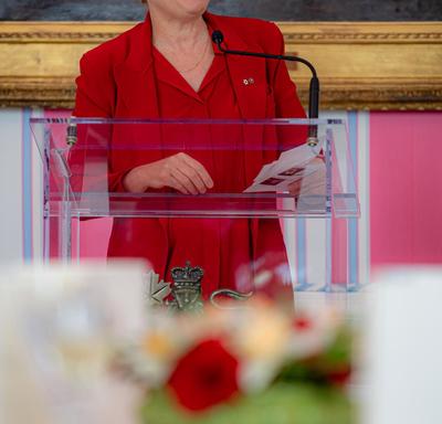 The Governor General spoke from a podium. 