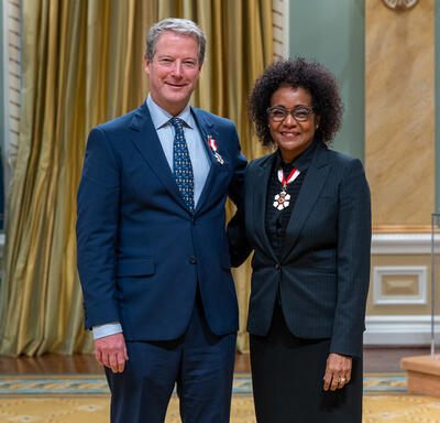 Peter Kendall is standing next to The Right Honourable Michaëlle Jean.