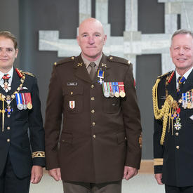 Chief Warrant Officer Richard Plante poses for a photo with the Governor General and the Chief of the Defence Staff.
