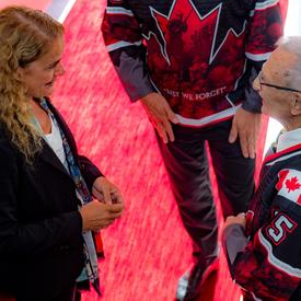 The Governor General speaks with Don White.