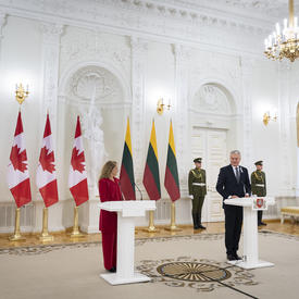 The Governor General and President Gitanas Nausėda deliver remarks from a podium. 