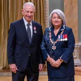  Allan Borodin is standing next to the Governor General.