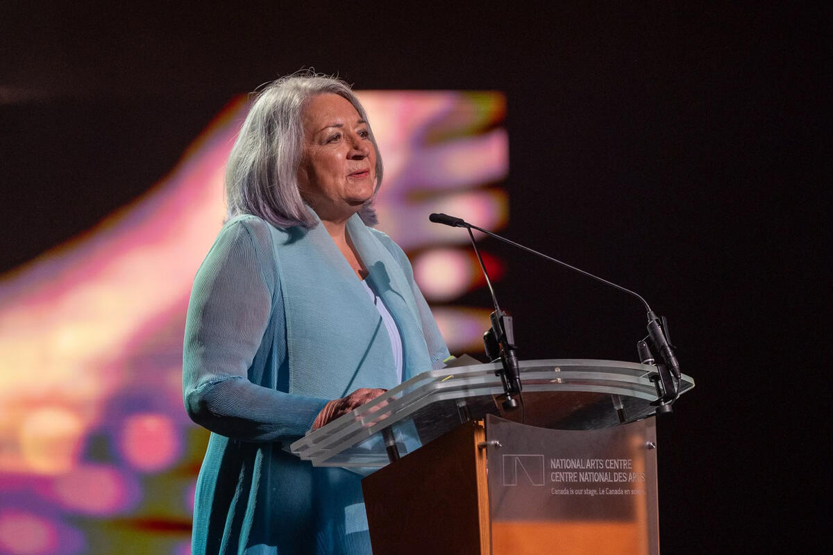 Governor General Mary Simon delivers her remarks at a podium during the Governor General's Performing Arts Awards Gala.