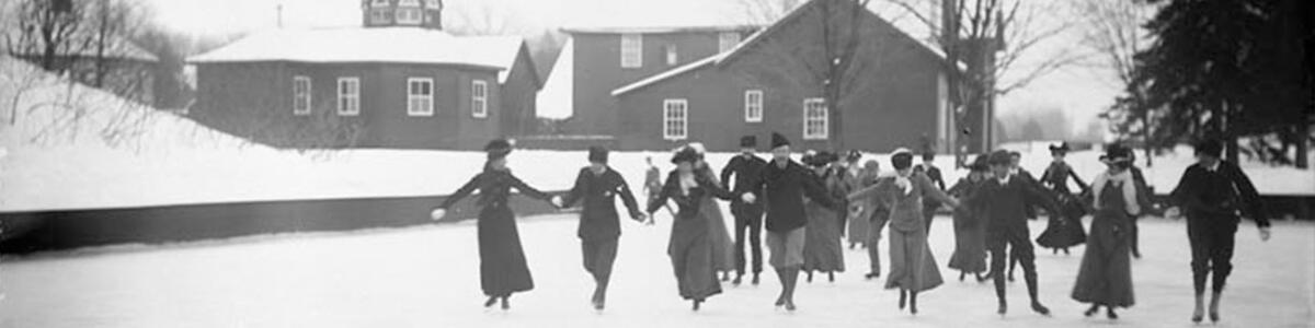 Black and white archived photo of people skating on the Rideau Hall Rink.
