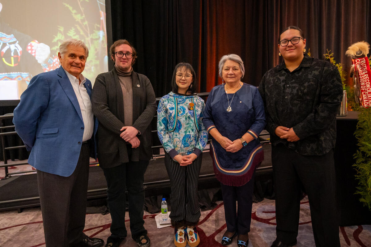 Group photo with Governor General Mary Simon, Mr. Whit Fraser and 3 other people.
