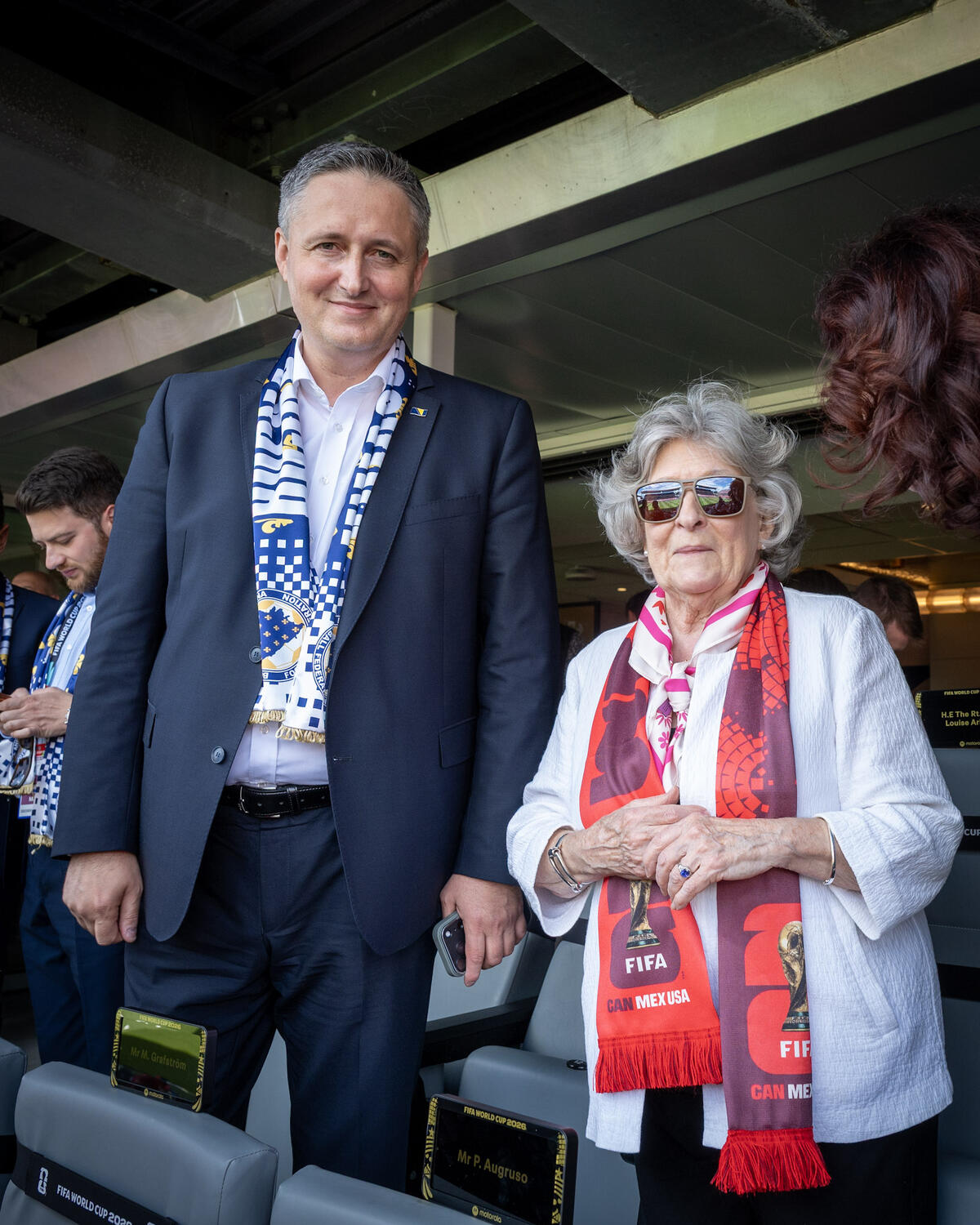 Governor General Louise Arbour standing next to His Excellency Denis Bećirović, Chairman of the Presidency of Bosnia and Herzegovina at the FIFA soccer match.