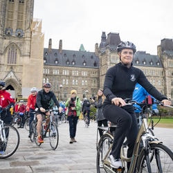 The Governor General riding her bike at Parliament Hill.