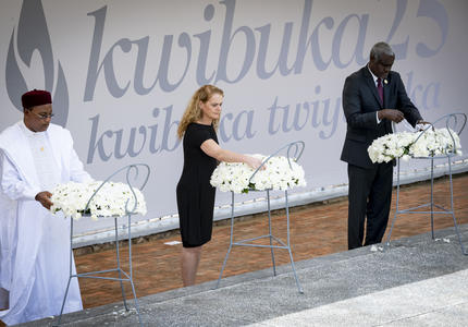 The Governor General is laying a wreath at the Kigali Genocide Memorial.