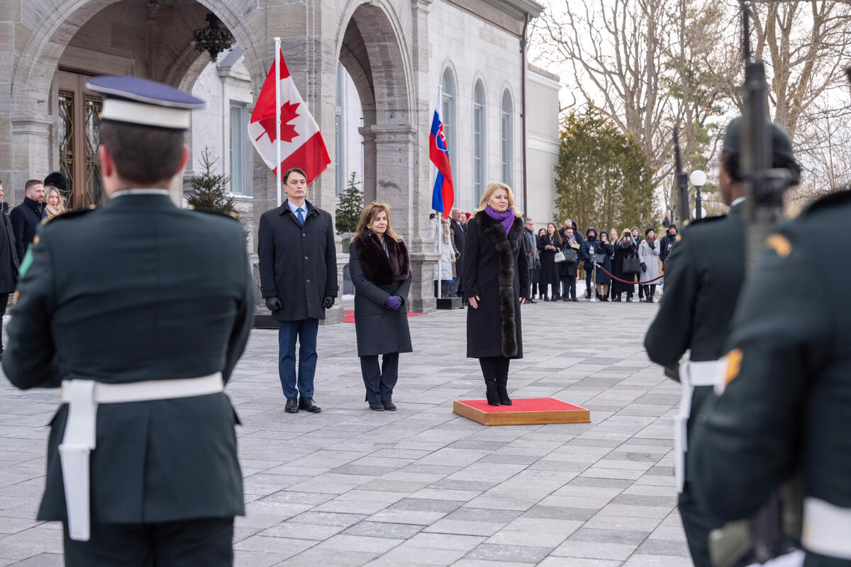 President Čaputová and Mr. Rizman stand with Justice Karakatsanis during the Honour Guard